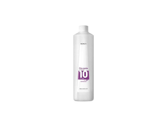 Front view bottle of Redken Pro-Oxide Cream Developer 10 Volume 3 percent 1000ml for professional salon hair coloring