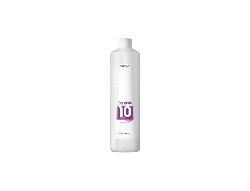 Front view bottle of Redken Pro-Oxide Cream Developer 10 Volume 3 percent 1000ml for professional salon hair coloring