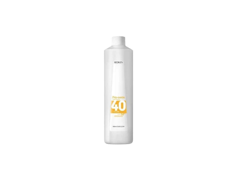 1000ml bottle of professional Redken Pro-Oxide Cream Developer 40 Volume 12 percent for maximum-lift hair bleaching and high-lift blonde coloring